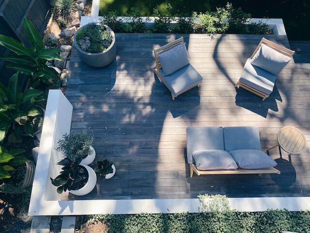 Reviving Your Outdoor Space: How To Restore a Weathered Deck for Summer Entertaining