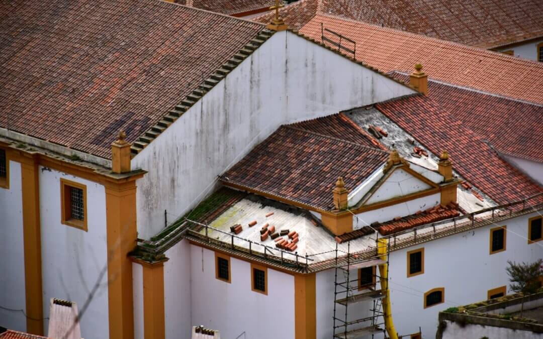 Securing Your Skyline: Decoding the Fine Print on Insurance and Roof Replacement Benefits